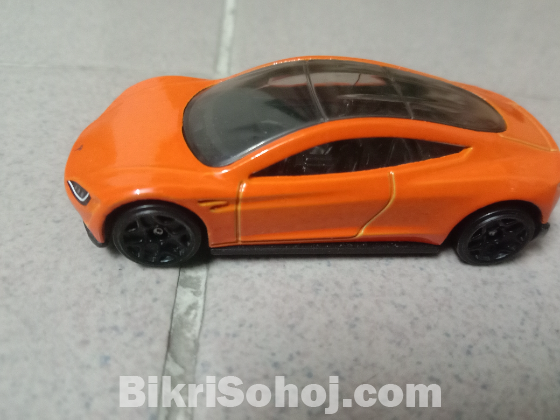 Hotwheels (Tesla Roadster), Matchbox (Tesla Model S)